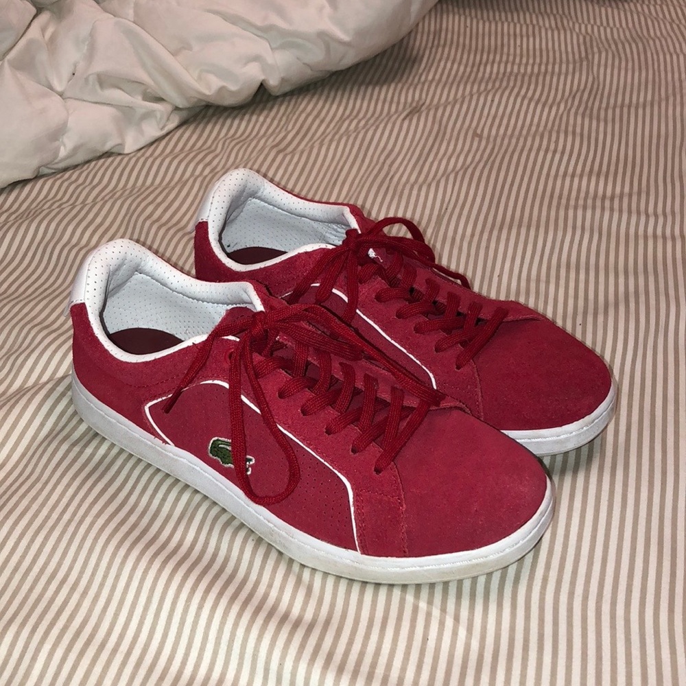 Red suede Lacoste sneakers